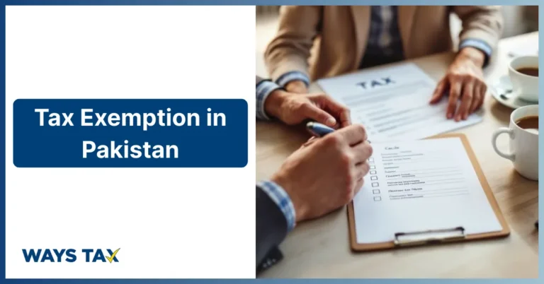Tax Exemption in Pakistan – a professional scene showing individuals reviewing and signing tax documents on a clipboard, representing tax planning and exemptions, featured by waysTax.
